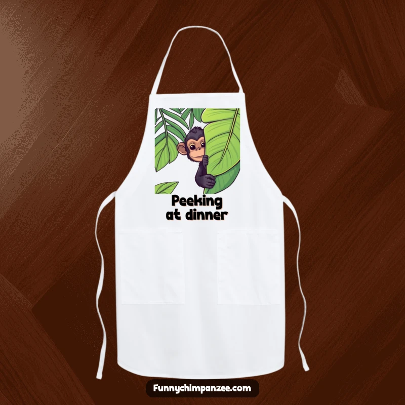 Funny Kawaii chimpanzee peeking from behind a large jungle leaf on a kitchen apron, bringing a playful and mischievous jungle vibe.